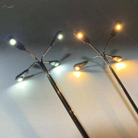 Ho scale LED street lamps with chrome miniature lights glowing warm and cool white