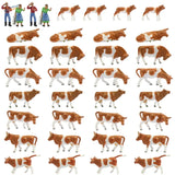HO scale livestock farmers: brown and white plastic cow figurines in various poses