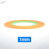 Orange and green 1mm thick ultra-thin adhesive tape roll from hobby design for precision hobby tools and scale modeling tools