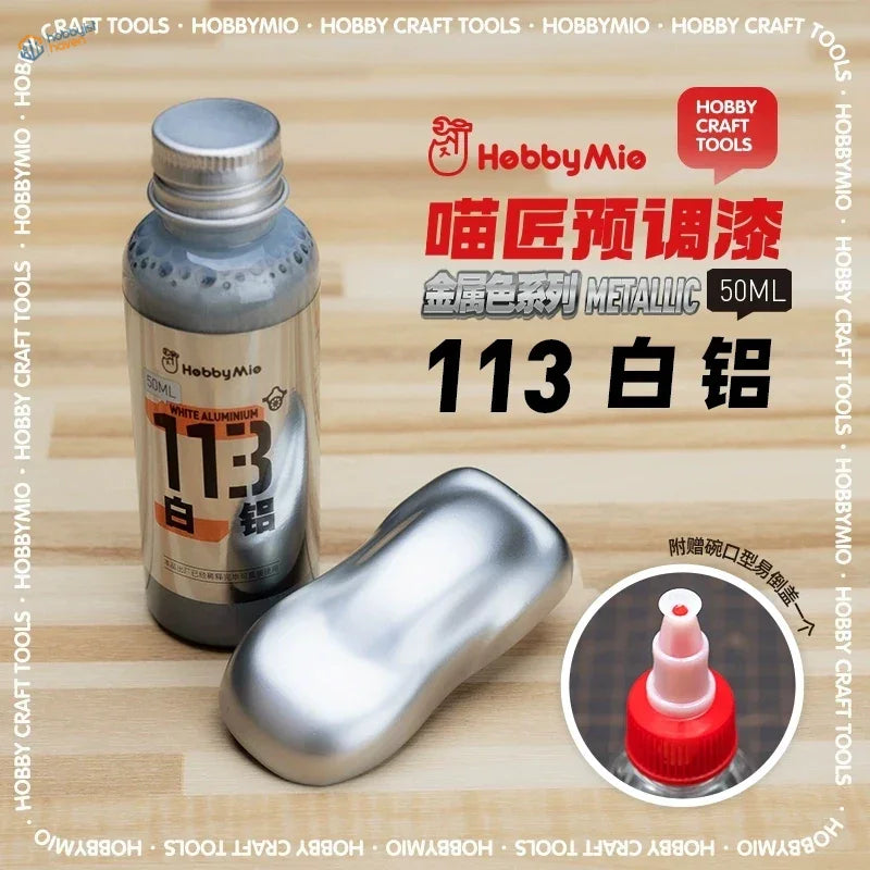 A sleek metallic silver 50ml bottle of hobby mio oil-based aluminum metallic paint for scale modeling tools