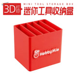 Red plastic hobby mio mini tool storage box with five vertical slots for scale modeling tools and model building tools