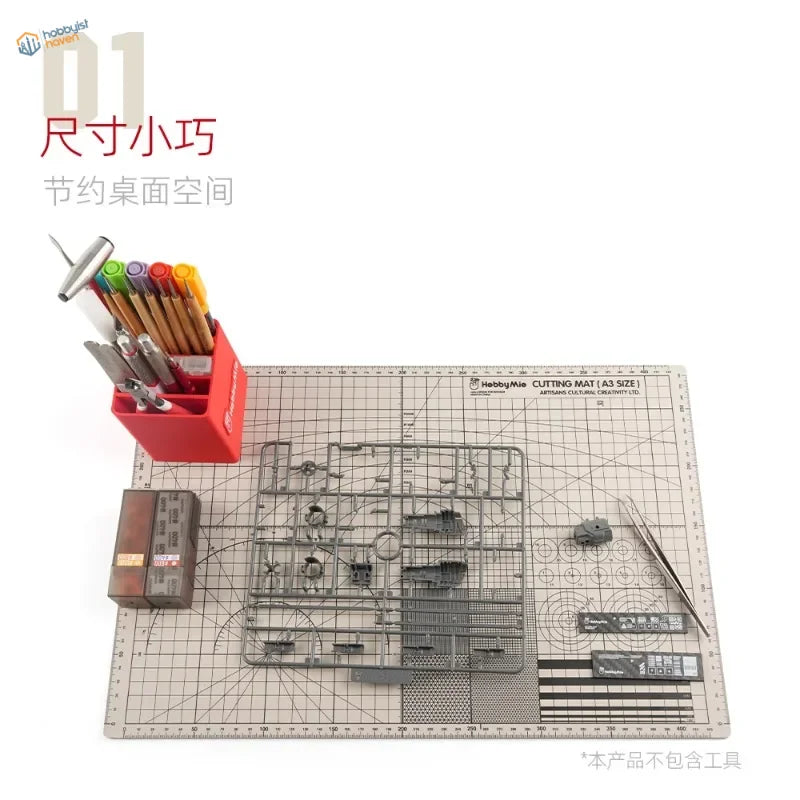 Gray plastic model kit parts laid on a grid cutting mat showcasing hobby mio scale modeling tools for model building tools organization
