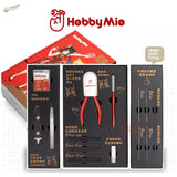 Red-handled pliers with cat face in Hobby Mio scale modeling toolset