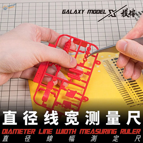Red plastic galaxy Holes/Panel Lines Measuring Card with panel lines scale template