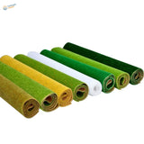 Landscape grass mat with rolled felt sheets in green, yellow, white shades