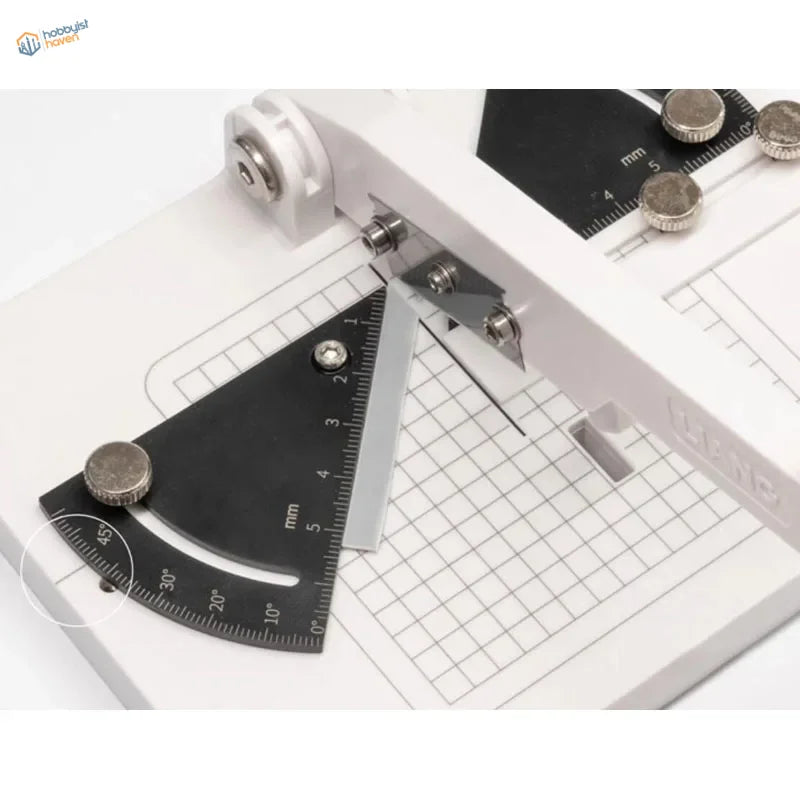 Liang angle cutting station with black triangular protractor on white mat