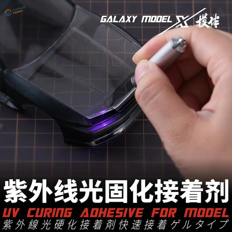 Transparent black scale model car body with rapid-curing UV glue applied