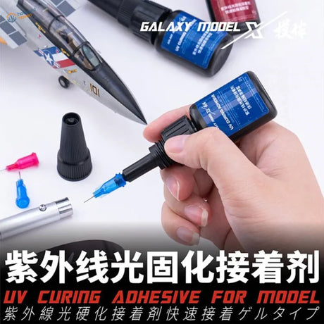 Black and blue rapid-curing UV glue bottle for scale modeling