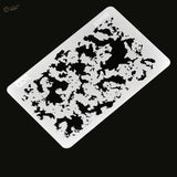 Silver rectangular stencil with black camo for streaking effects in scale modeling
