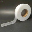 Marbling masking tape roll with white semi-transparent textured surface