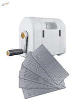 White Sizzix masking tape die cutting machine with silver dies