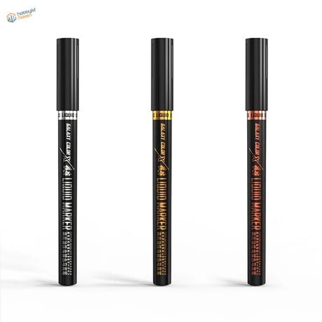 Three black metallic color marker pens with gold orange accents