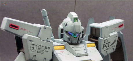 Gray Gundam model with E.F.S.F. insignia and metallic color sticker accents