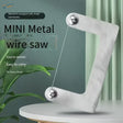 Silver mini wire saw with sharp taut metal blade designed for scale modeling tools and model building tools