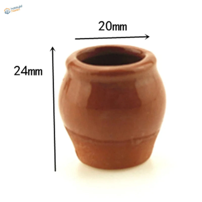 Exquisite miniature flowers in terracotta ceramic pot for dioramas