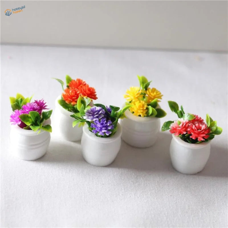 Exquisite miniature flowers in white ceramic pots for dioramas