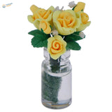 Exquisite miniature yellow clay roses in glass vase for dioramas