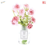 Exquisite miniature flowers in clear vase with gook luck label for dioramas