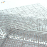 Transparent miniature railing in plastic cart with metal grid frame for scale modeling