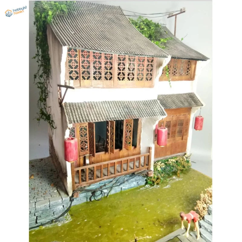 Miniature resin vine house with tiled roof, lattice windows, red lanterns