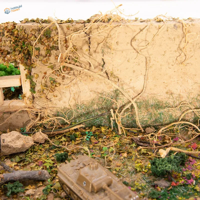 Miniature vine tree roots with tan plastic tank and black cross emblem