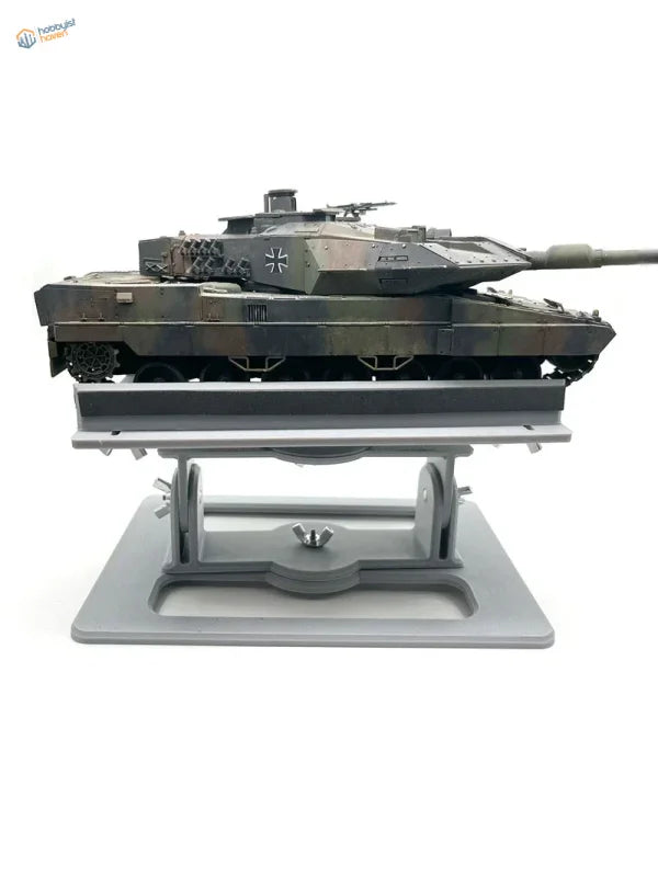 Detailed Leopard 2 tank model in camouflage with Iron Cross in Model AFV Holder