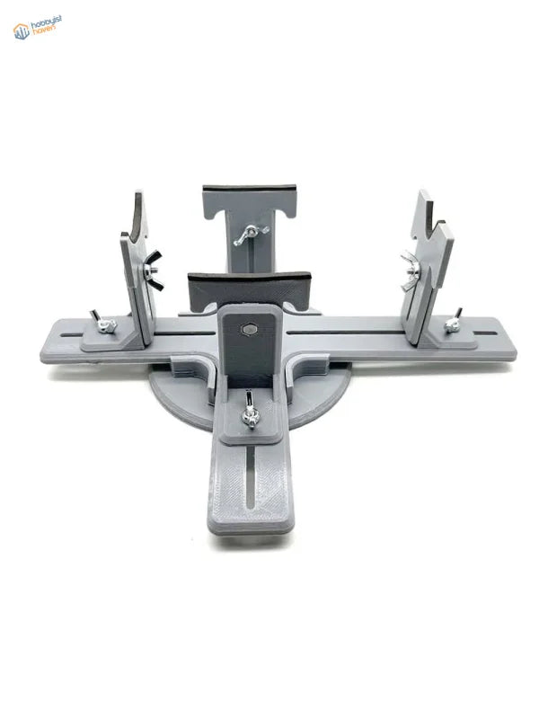 Gray plastic 3D-printed model aircraft holder with adjustable clamps