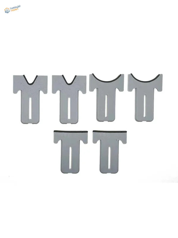 Six gray T-shaped clips with black rubber edges for model aircraft holder