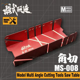 Red multi-angle cutting tool with white angle markings on saw table