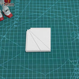 White 1mm-thick plastic square pieces with diagonal grooves for multi-angle gluing jig used in scale modeling tools