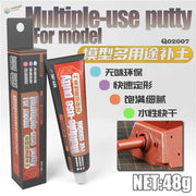 Black and red multi-purpose acrylic putty tube with white cap