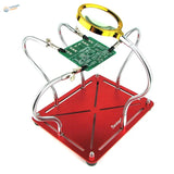 Multifunction soldering station with red stand holding green PCB under magnifier