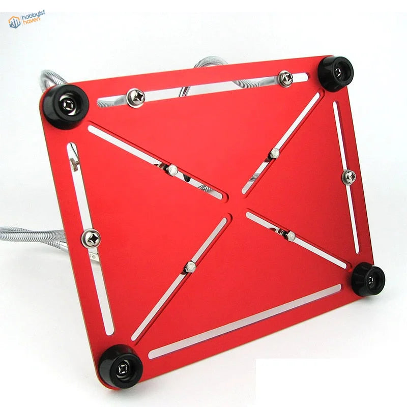 Red aluminum cooling plate on multifunction soldering station for scale modeling