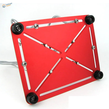 Red aluminum cooling plate on multifunction soldering station for scale modeling