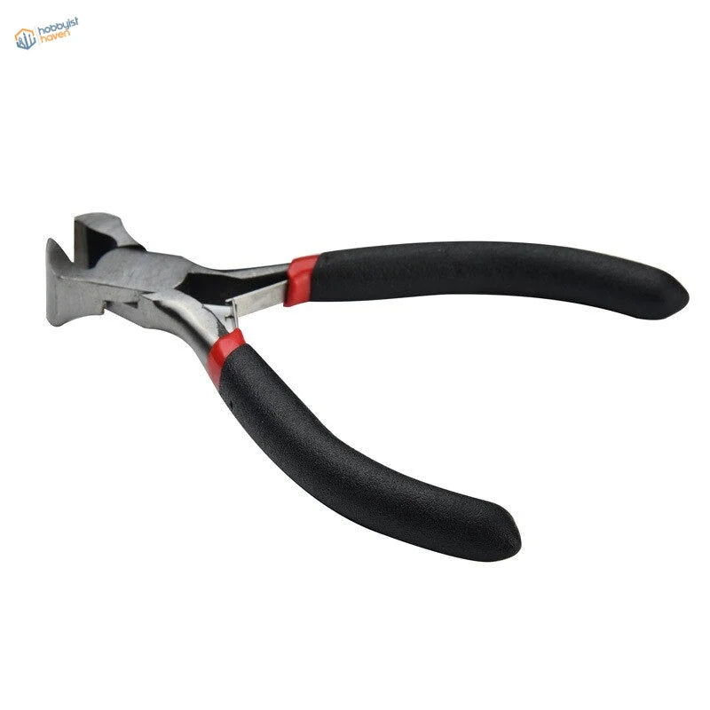 Black-handled insulated pliers with red accents for scale modeling tools