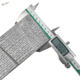 Silver digital caliper measuring gray metallic n scale stone retaining wall with textured embossed brick pattern