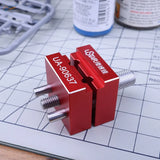 Precision mini vise UA-90637 with red aluminum clamps and textured handle