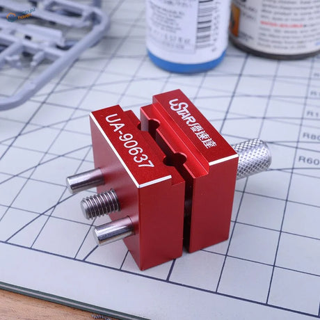 Precision mini vise UA-90637 with red aluminum clamps and textured handle