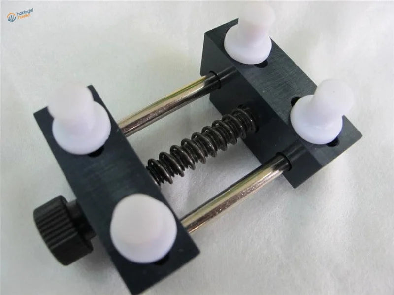 Precision mini vise black plastic clamp with white knob handles