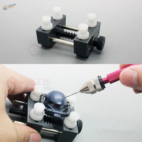 Precision mini vise with black and white adjustable clamps for watch repair