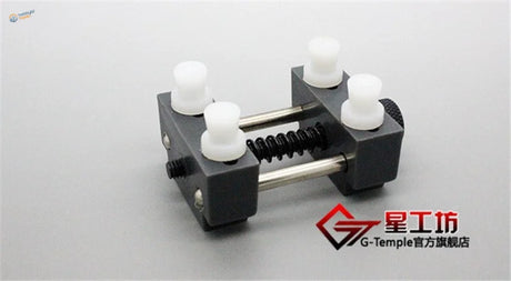 Precision mini vise black plastic watch winding tool with white knobs