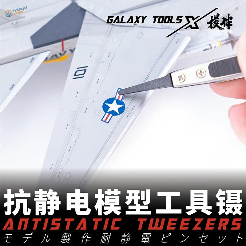 Pro-grade antistatic tweezers with replaceable chucks placing star insignia on model airplane wing