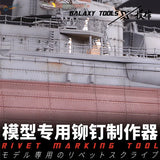 Gray reddish-brown model ship with rivets made using rivet making tool
