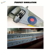 Gray model airplane rivet making tool with handle, blue red roundel wing