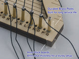 Wooden rope ladder weaving jig with brass posts and black cords for ladder weaving projects