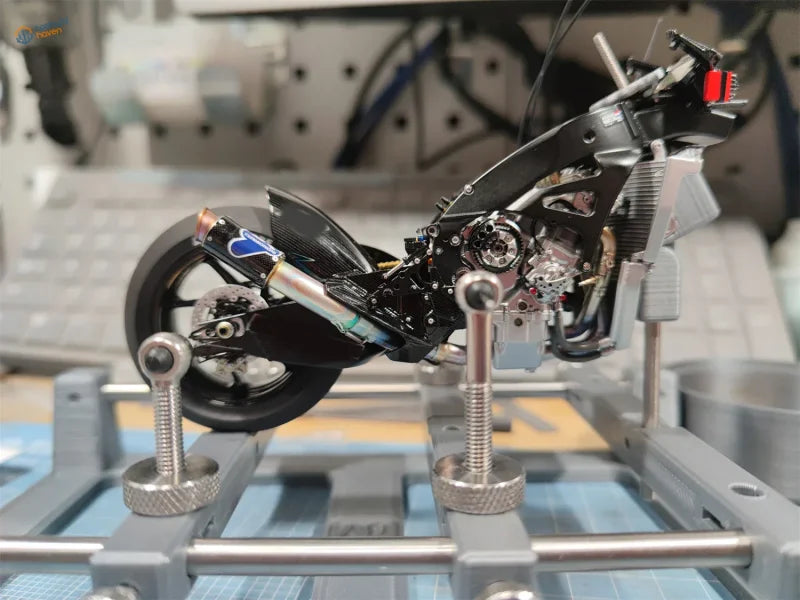 Black and silver motorcycle model on rotating holder for 1/18 1/12 scale models
