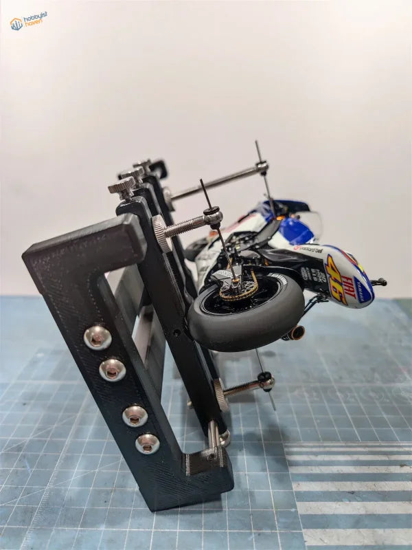 1:8 scale blue racing motorcycle on rotating holder for motorcycle models