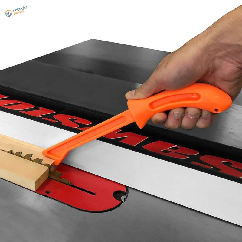 Orange plastic hand-held push stick for standard width push blocks