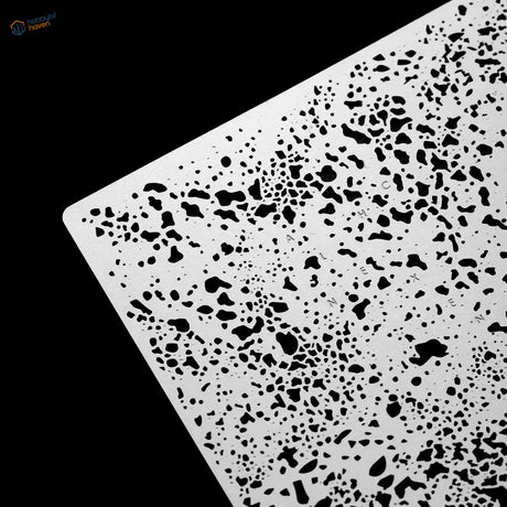 White plastic salt weathering corrosion stencil with black speckled terrazzo pattern for precision hobby tools