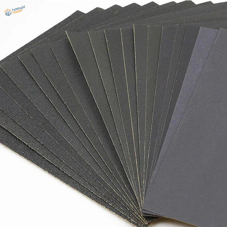 Premium sandpaper set with black abrasive sheets fanned out